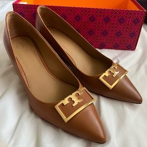 Tan Tory Burch flats with wedged heel